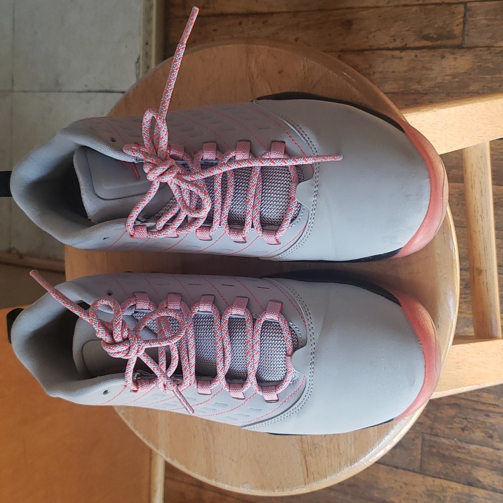 JORDAN" tennis shoes for big boys in grey, black and red.